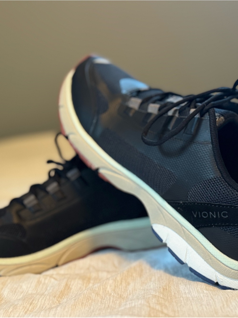 Vionic Black Lace-Up Sneaker with Cream Midsole and Navy Accents